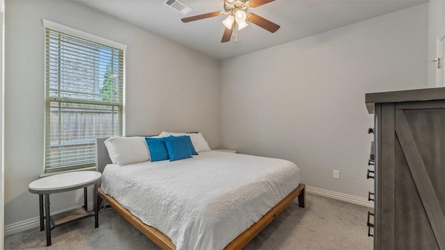 809 Ravine St, Cave Springs, AR 72718 - bedroom with baseboards, carpet, and a ceiling fan