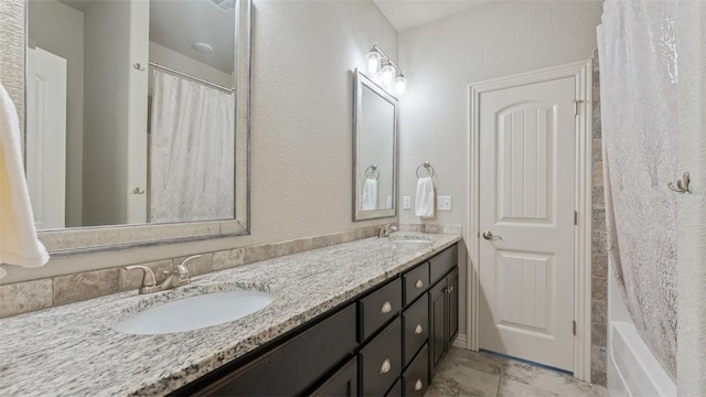 809 Ravine St, Cave Springs, AR 72718 - full bathroom featuring double vanity and shower / tub combo with curtain
