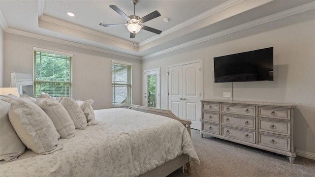 809 Ravine St, Cave Springs, AR 72718 - carpeted bedroom featuring ornamental molding, a raised ceiling, ceiling fan, and a closet