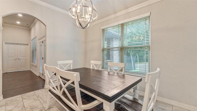 809 Ravine St, Cave Springs, AR 72718 - dining space featuring arched walkways, ornamental molding, healthy amount of natural light, baseboards, and a chandelier