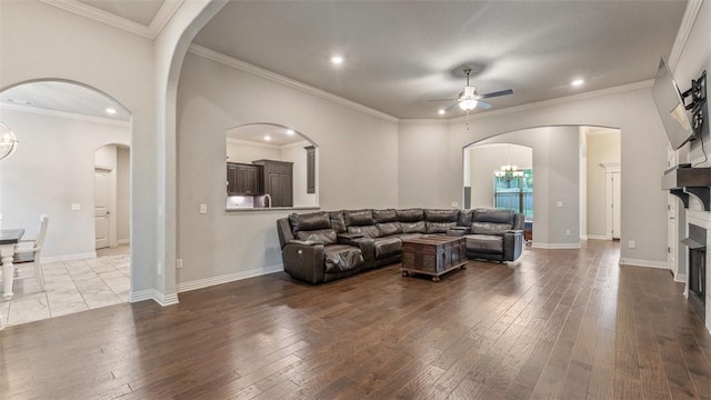 809 Ravine St, Cave Springs, AR 72718 - living room featuring ceiling fan, wood-type flooring, recessed lighting, crown molding, and baseboards