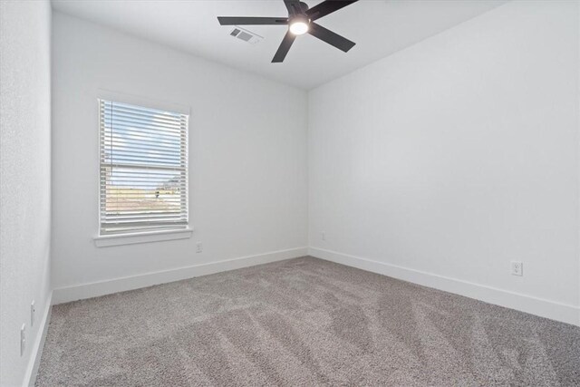 7101 SW Basswood Ave, Bentonville, AR 72713 - unfurnished room with carpet floors, ceiling fan, and baseboards