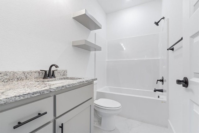 7101 SW Basswood Ave, Bentonville, AR 72713 - bathroom with marble look tile flooring, toilet, vanity, and bathtub / shower combination