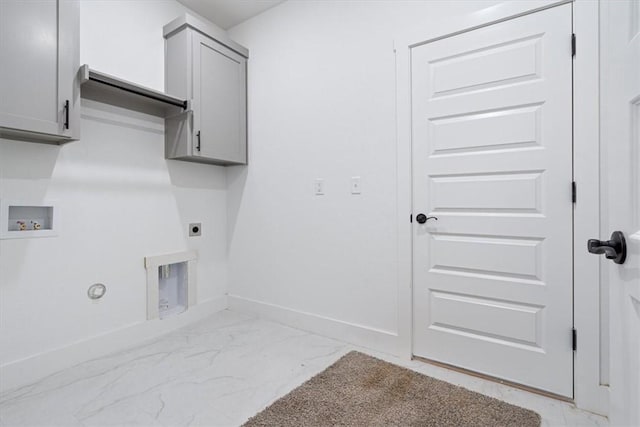 7101 SW Basswood Ave, Bentonville, AR 72713 - laundry area with electric dryer hookup, light marble finish floors, washer hookup, cabinet space, and gas dryer hookup