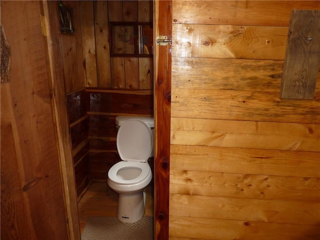 396 Dawn Light Dr, Western Grove, AR 72675 - bathroom featuring toilet and wood walls