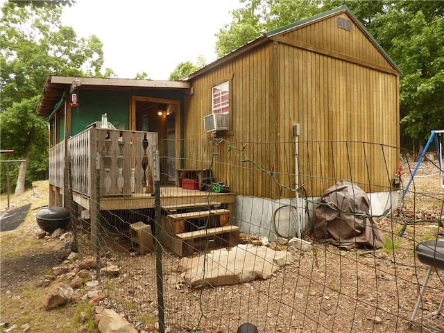 396 Dawn Light Dr, Western Grove, AR 72675 - view of outdoor structure featuring cooling unit and a playground