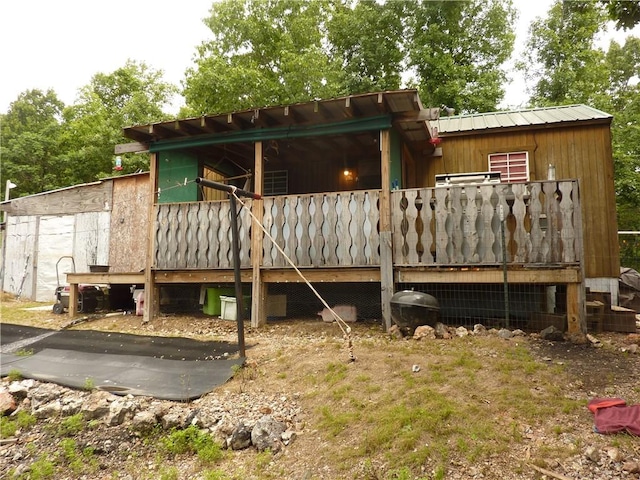 396 Dawn Light Dr, Western Grove, AR 72675 - back of house with metal roof and a wooden deck