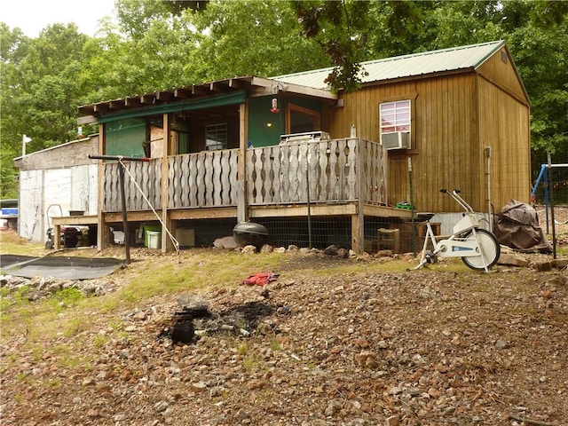 396 Dawn Light Dr, Western Grove, AR 72675 - rear view of house with metal roof and cooling unit