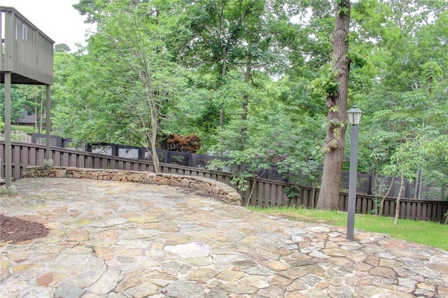 1588 N Tanglebriar Ln, Fayetteville, AR 72701 - fenced backyard featuring a patio area