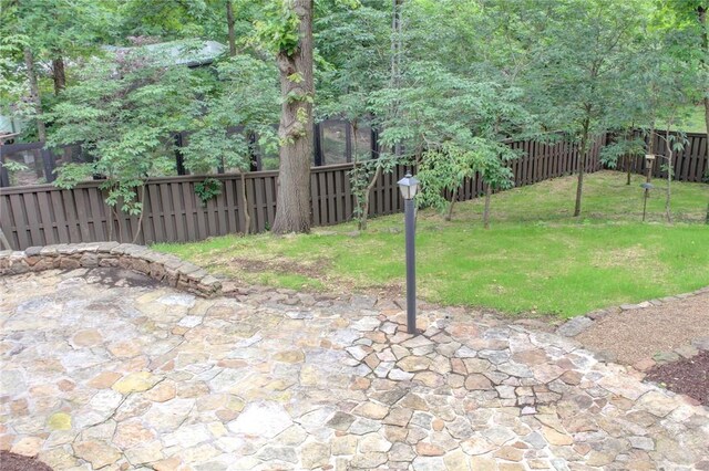 1588 N Tanglebriar Ln, Fayetteville, AR 72701 - view of yard featuring a patio