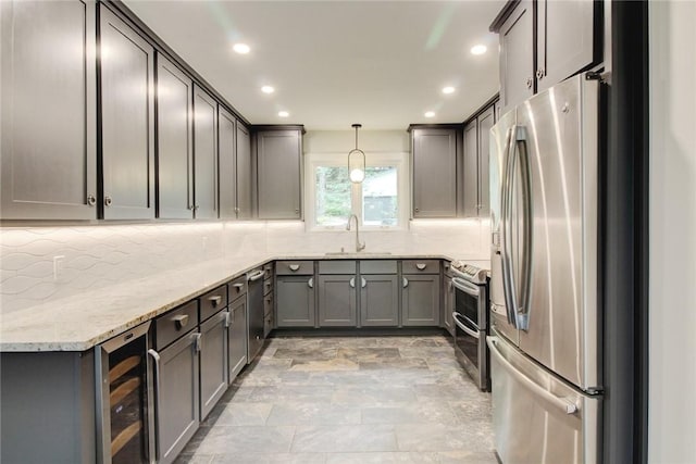 1588 N Tanglebriar Ln, Fayetteville, AR 72701 - kitchen with stainless steel appliances, beverage cooler, a sink, tasteful backsplash, and recessed lighting