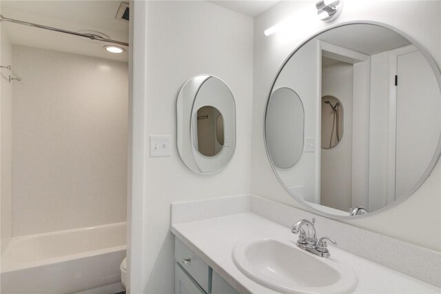 1588 N Tanglebriar Ln, Fayetteville, AR 72701 - full bathroom featuring vanity, toilet, and shower / bathtub combination