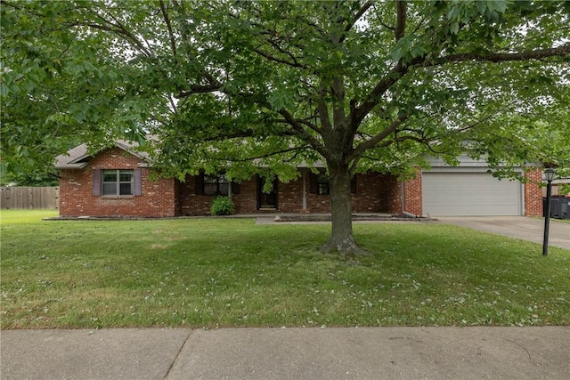 1719 Ridgeview Dr, Springdale, AR 72762 - view of front of property with driveway, brick siding, and a garage