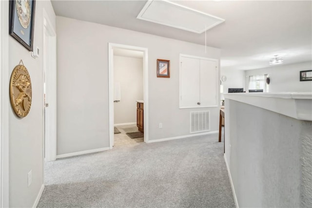 1017 Richland Creek Ave, Elkins, AR 72727 - hall with attic access, light colored carpet, and baseboards