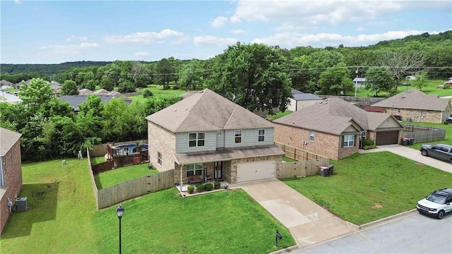 1017 Richland Creek Ave, Elkins, AR 72727 - view from above of property with a heavily wooded area