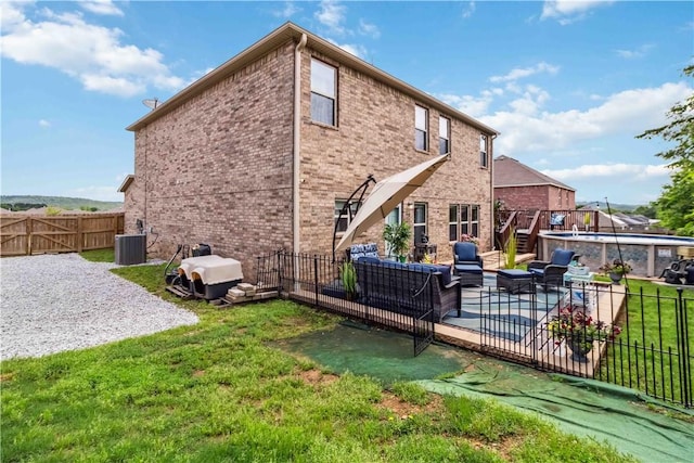 1017 Richland Creek Ave, Elkins, AR 72727 - rear view of property with a patio, an outdoor living space, stairs, central air condition unit, and brick siding