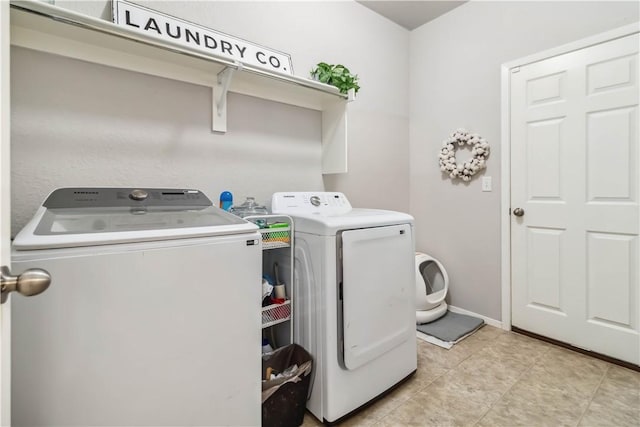 1017 Richland Creek Ave, Elkins, AR 72727 - laundry area with independent washer and dryer and baseboards
