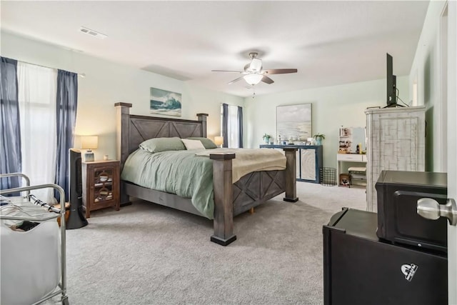 1017 Richland Creek Ave, Elkins, AR 72727 - carpeted bedroom with ceiling fan