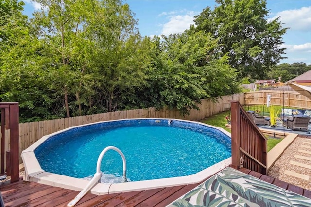 1017 Richland Creek Ave, Elkins, AR 72727 - view of pool featuring a deck and a fenced backyard