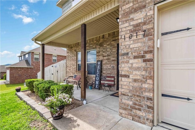 1017 Richland Creek Ave, Elkins, AR 72727 - entrance to property featuring brick siding and a porch