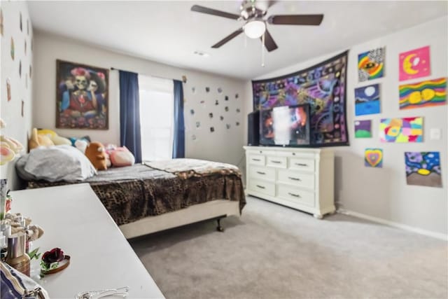 1017 Richland Creek Ave, Elkins, AR 72727 - carpeted bedroom featuring ceiling fan and baseboards