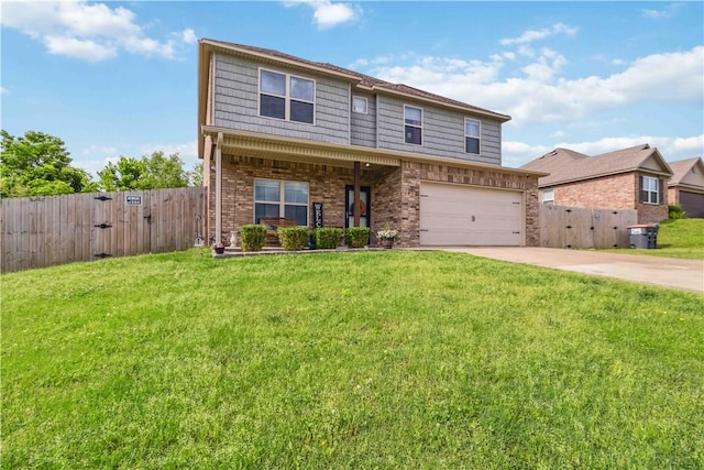 1017 Richland Creek Ave, Elkins, AR 72727 - view of front of property featuring a gate, an attached garage, concrete driveway, and brick siding