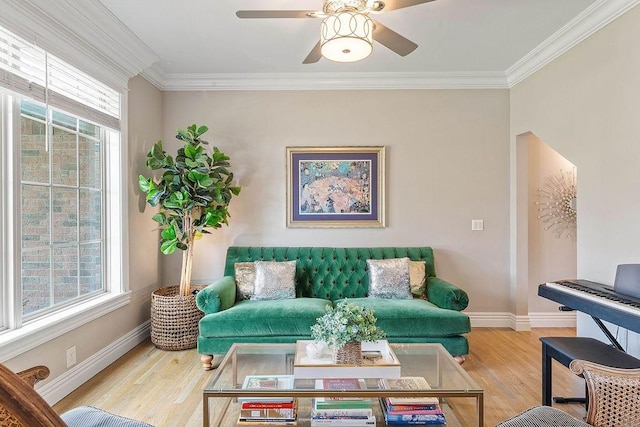 1000 Halifax Pl, Bentonville, AR 72712 - living room with ornamental molding, wood finished floors, baseboards, and ceiling fan