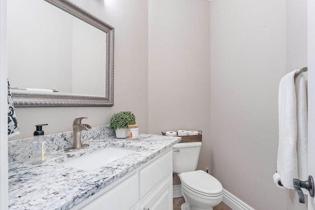 1000 Halifax Pl, Bentonville, AR 72712 - bathroom featuring vanity, toilet, and baseboards