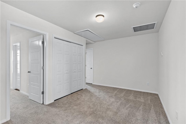 851 E Sparrow Cir, Fayetteville, AR 72701 - unfurnished bedroom with attic access, carpet, baseboards, and a closet