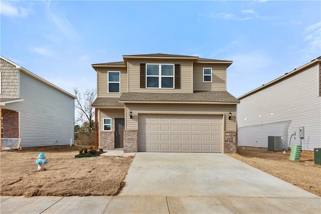 851 E Sparrow Cir, Fayetteville, AR 72701 - view of front of property featuring brick siding, a garage, driveway, central AC unit, and a shingled roof