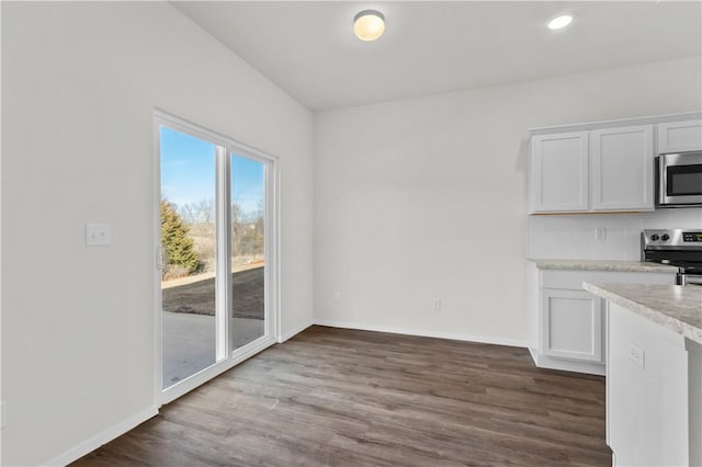 851 E Sparrow Cir, Fayetteville, AR 72701 - unfurnished dining area with dark wood finished floors, baseboards, and recessed lighting