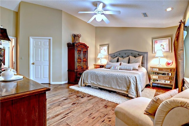811 E Township St, Fayetteville, AR 72703 - bedroom with light wood-type flooring, lofted ceiling, recessed lighting, ceiling fan, and baseboards