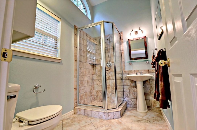 811 E Township St, Fayetteville, AR 72703 - full bath with toilet, a stall shower, and baseboards