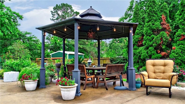 811 E Township St, Fayetteville, AR 72703 - view of patio with a gazebo and outdoor dining area