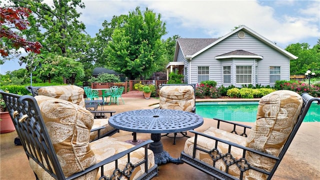 811 E Township St, Fayetteville, AR 72703 - view of swimming pool with outdoor dining space and a patio