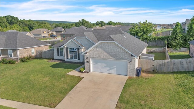 1461 Colonel Mcneil Dr, Prairie Grove, AR 72753 - view of front of property featuring brick siding, an attached garage, a residential view, driveway, and a shingled roof