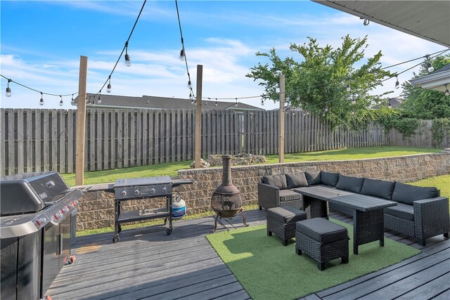 1461 Colonel Mcneil Dr, Prairie Grove, AR 72753 - deck with an outdoor living space, a fenced backyard, and area for grilling