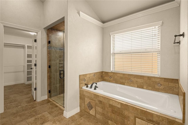 3504 NW Edgewood Ave, Bentonville, AR 72712 - bathroom with a garden tub, a spacious closet, a stall shower, and lofted ceiling