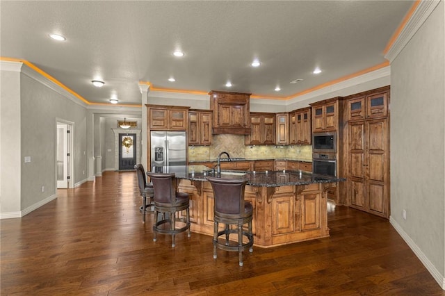 3504 NW Edgewood Ave, Bentonville, AR 72712 - kitchen with stainless steel appliances, brown cabinets, ornamental molding, a breakfast bar, and decorative backsplash