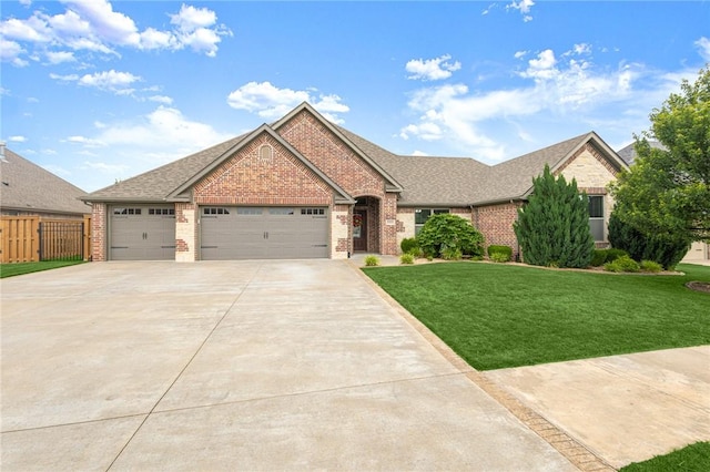 3504 NW Edgewood Ave, Bentonville, AR 72712 - view of front of home featuring brick siding, a garage, driveway, and a shingled roof