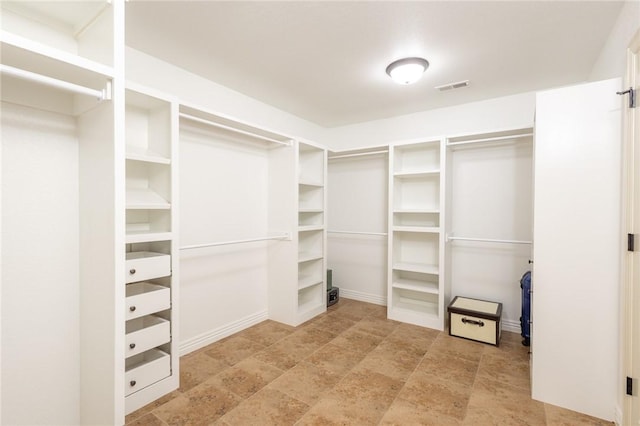 3504 NW Edgewood Ave, Bentonville, AR 72712 - spacious closet featuring light stone finish flooring