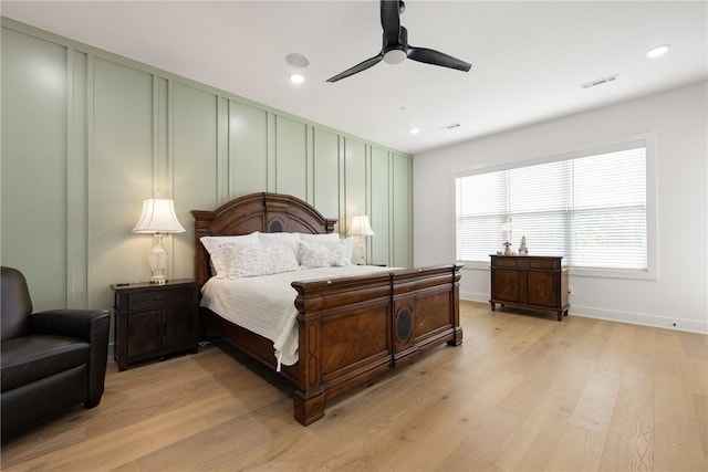 301 SW Autumn Hills Rd, Bentonville, AR 72712 - bedroom with a decorative wall, light wood finished floors, recessed lighting, baseboards, and ceiling fan