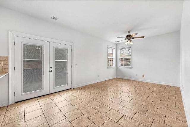 4801 SW Golden Eagle Ave, Bentonville, AR 72713 - unfurnished room featuring a ceiling fan, french doors, and baseboards
