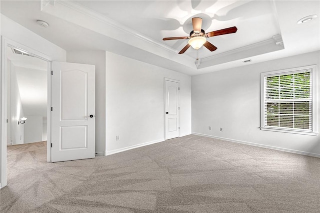 4801 SW Golden Eagle Ave, Bentonville, AR 72713 - unfurnished bedroom featuring ornamental molding, carpet floors, a tray ceiling, baseboards, and ceiling fan