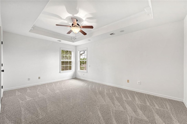 4801 SW Golden Eagle Ave, Bentonville, AR 72713 - carpeted spare room featuring a raised ceiling, a ceiling fan, and baseboards