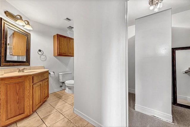4801 SW Golden Eagle Ave, Bentonville, AR 72713 - bathroom featuring vanity, toilet, baseboards, and tile patterned floors