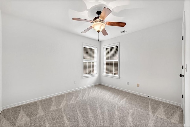 4801 SW Golden Eagle Ave, Bentonville, AR 72713 - carpeted spare room featuring baseboards and ceiling fan