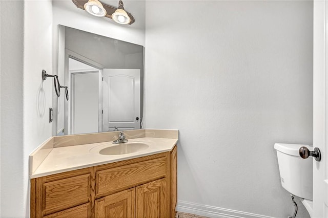 4801 SW Golden Eagle Ave, Bentonville, AR 72713 - half bath with vanity, baseboards, and toilet