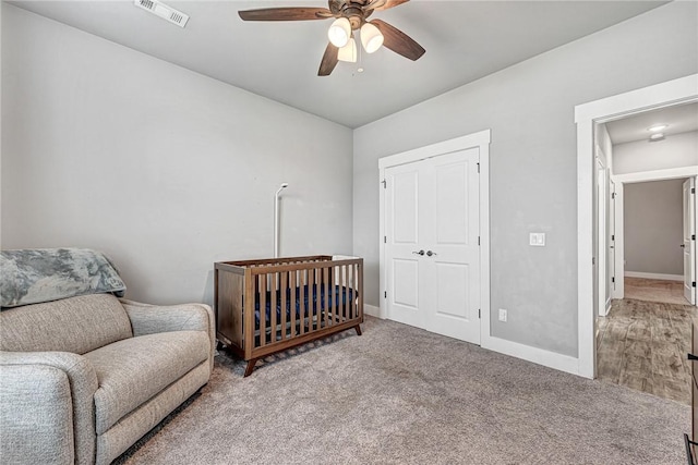 1140 Durante St, Tontitown, AR 72762 - bedroom featuring carpet flooring, baseboards, and a ceiling fan