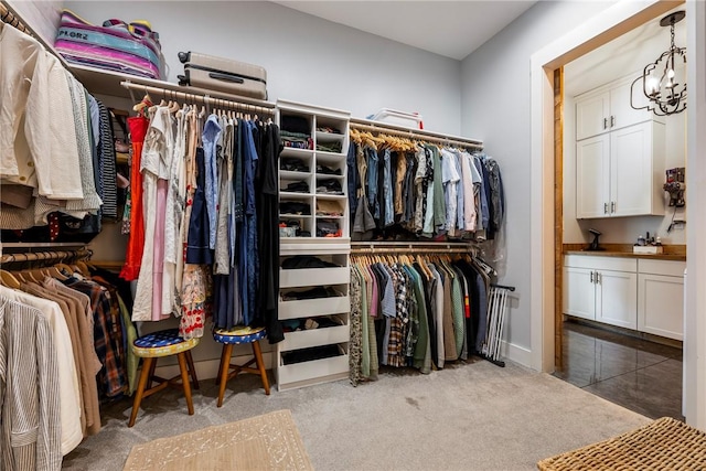 112 E Woodside Ln, Rogers, AR 72756 - walk in closet featuring carpet